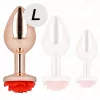 KINK – Rózsaarany színű rozsdamentes acél anál plug piros rózsa díszítéssel, 10,2 cm