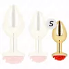 KINK – Arany színű rozsdamentes acél anál plug piros rózsa díszítéssel, 7,8 cm